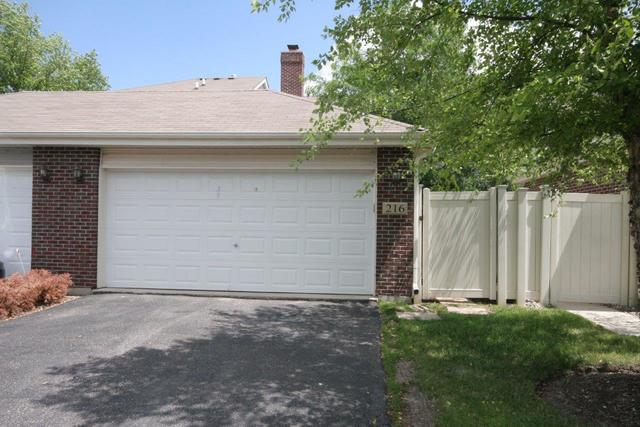 216 Longview Drive Elgin, IL 60124 - Photo 20 of 20 a wooden house with a outdoor space