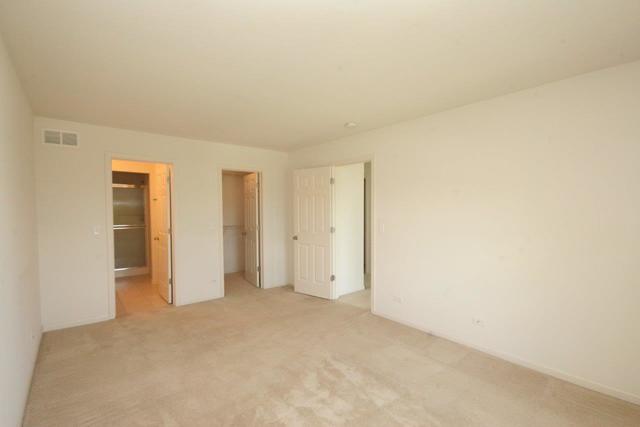 216 Longview Drive Elgin, IL 60124 - Photo 10 of 20 a view of an empty room