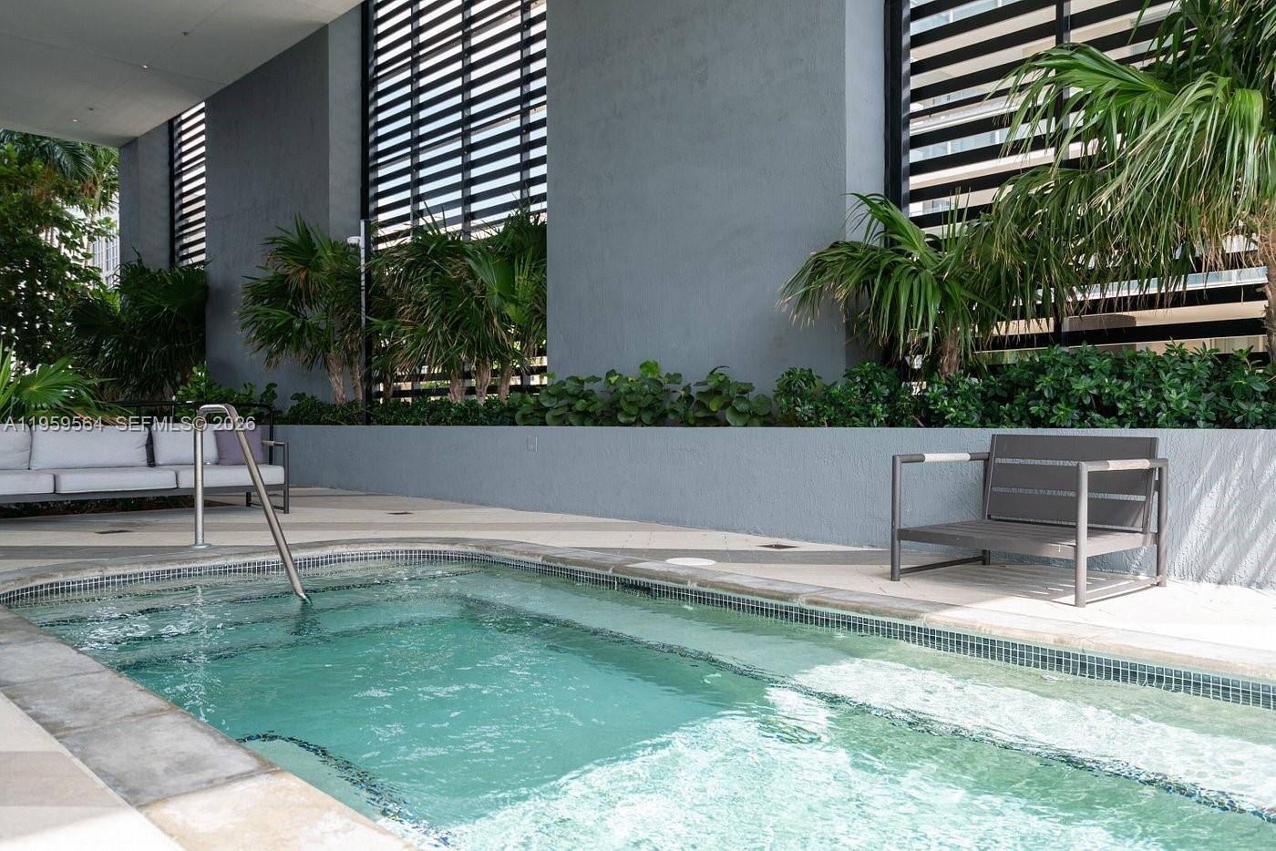 121 Northeast 34th Street, Unit L401 Miami, FL 33137 - Photo 33 of 37 a view of backyard with a small garden