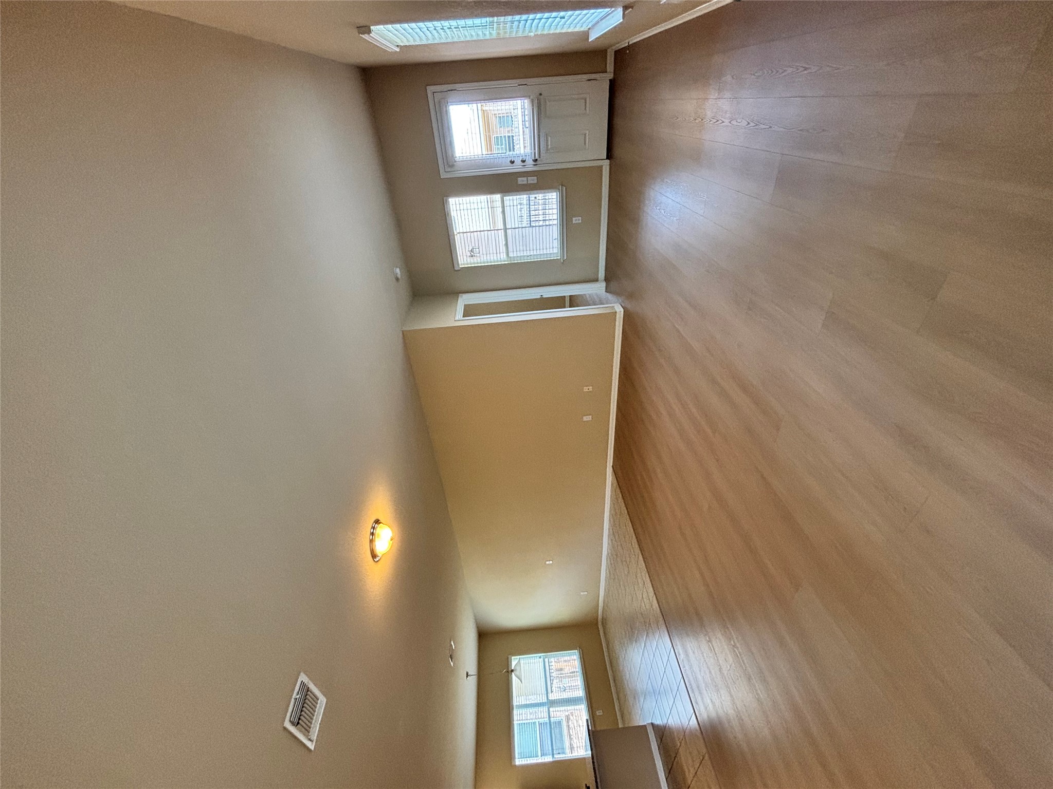 1602 Atlas Road Cedar Park, TX 78613 - Photo 2 of 13 A vast, inviting living space offers both laminate and tile flooring, perfect for versatile design.