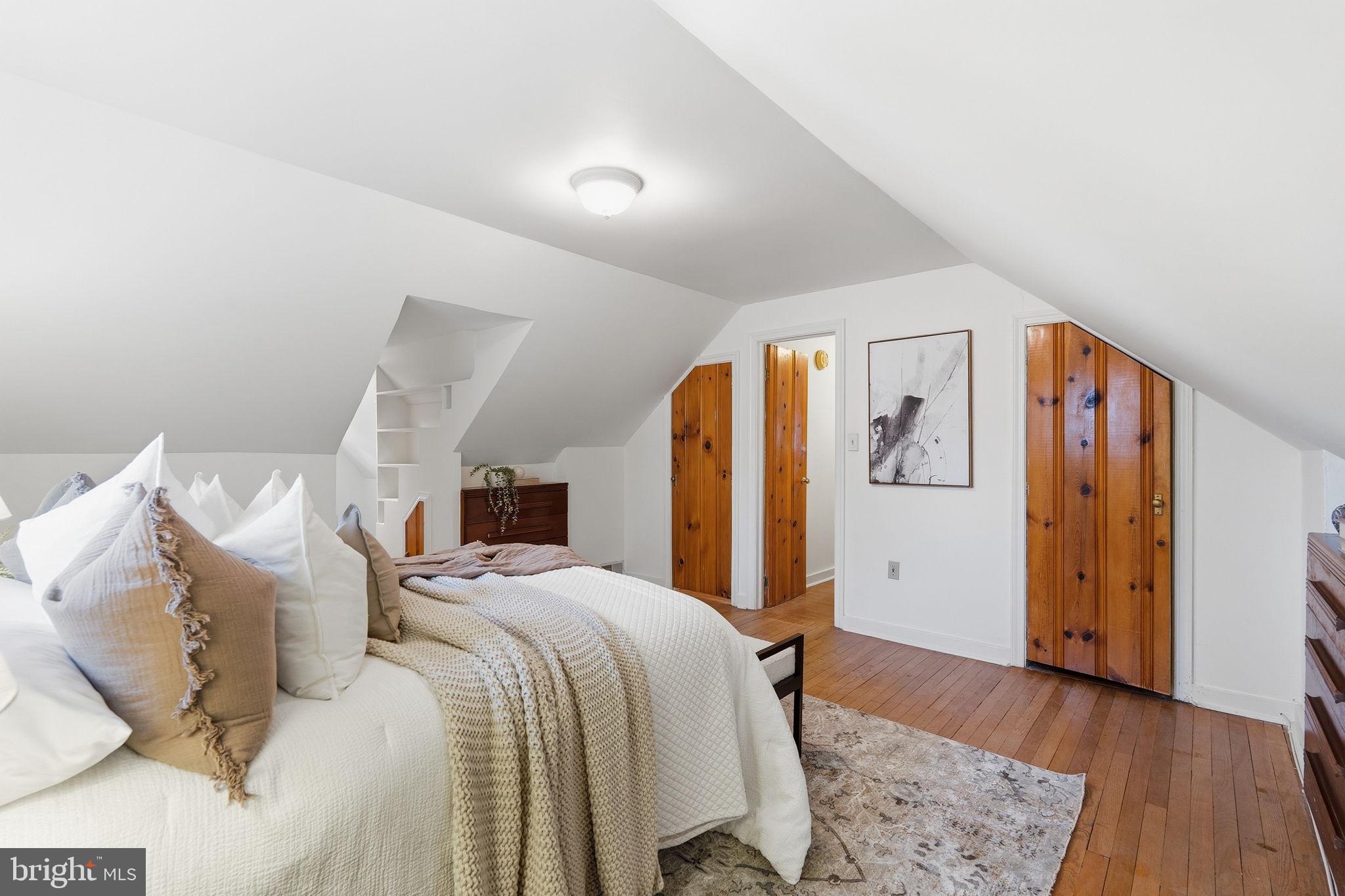 9504 Riley Road Silver Spring, MD 20910 - Photo 18 of 26 Cozy attic retreat with warm wood accents.