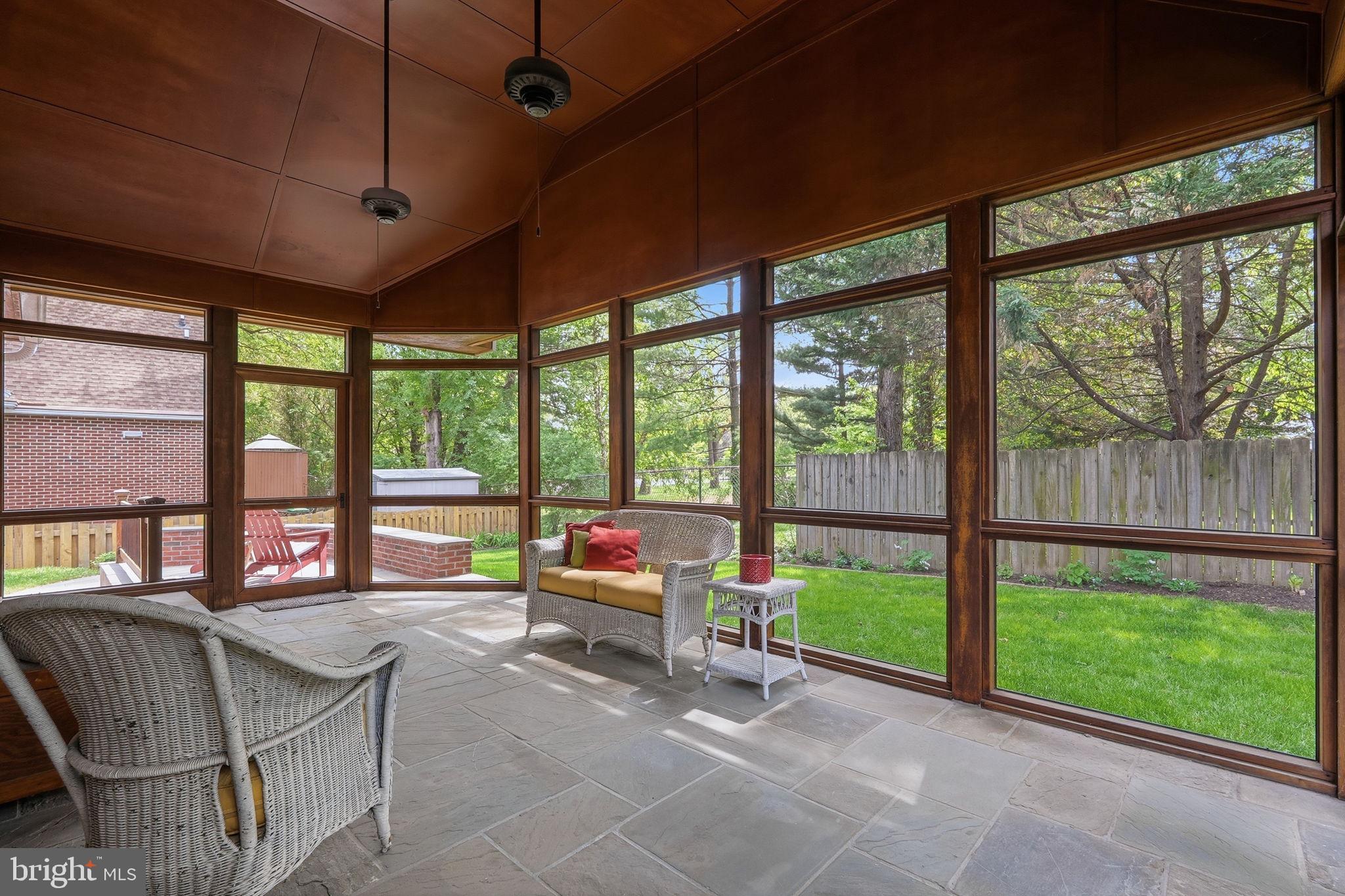 9504 Riley Road Silver Spring, MD 20910 - Photo 23 of 26 Serene sunlit screened porch retreat.