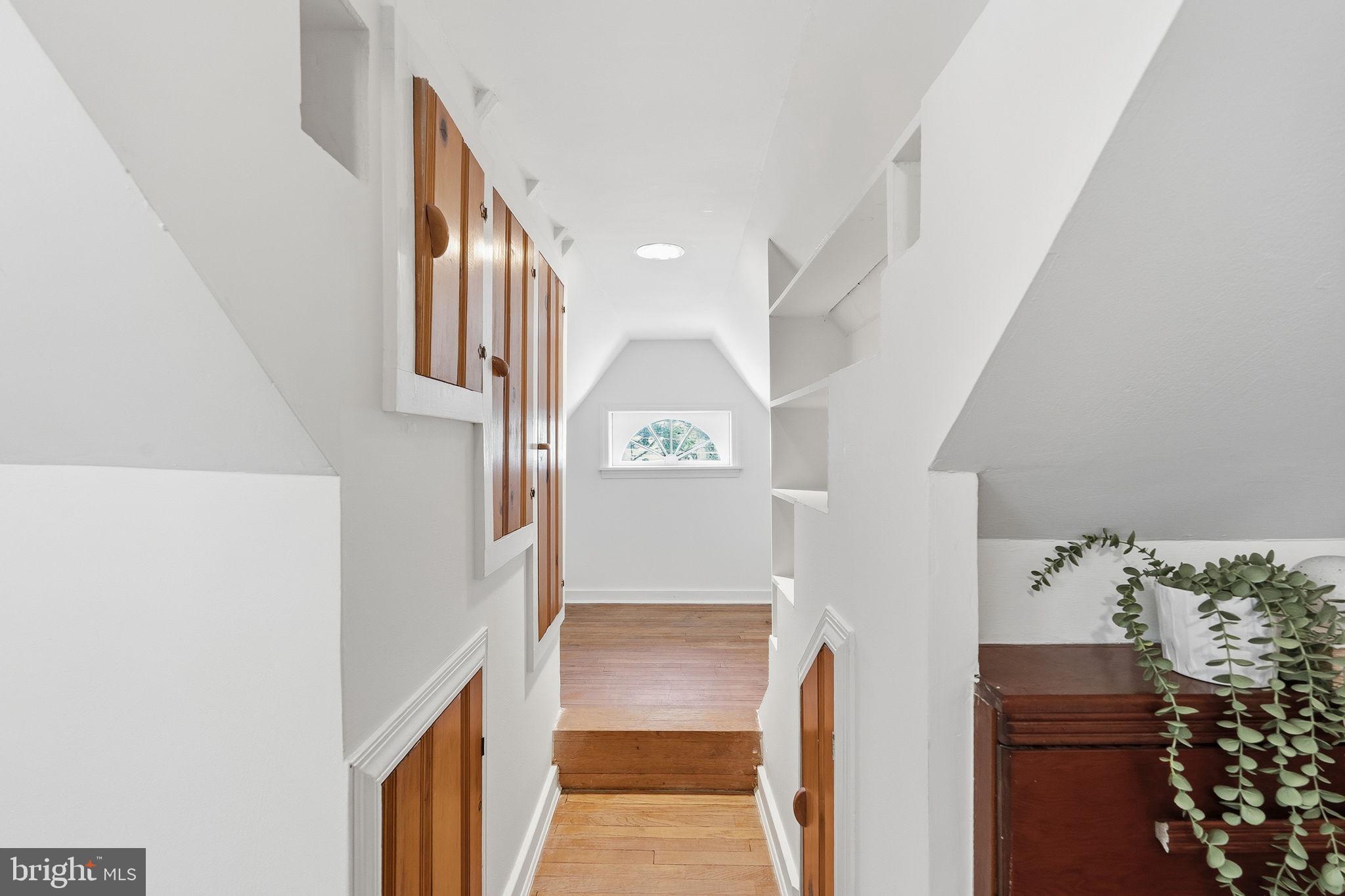 9504 Riley Road Silver Spring, MD 20910 - Photo 3 of 26 Bright and airy attic hallway retreat.