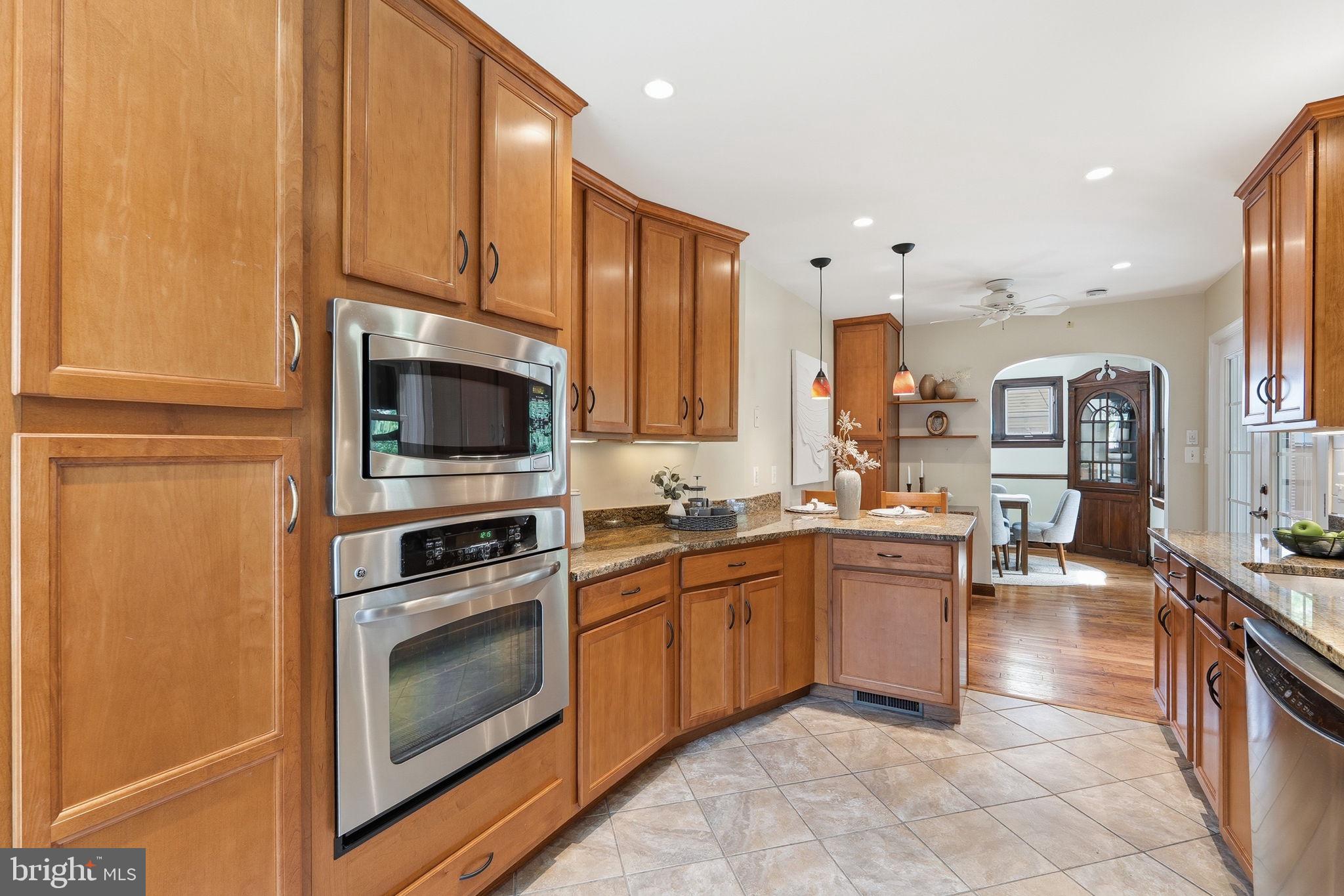 9504 Riley Road Silver Spring, MD 20910 - Photo 7 of 26 Warm wood tones in a modern kitchen.