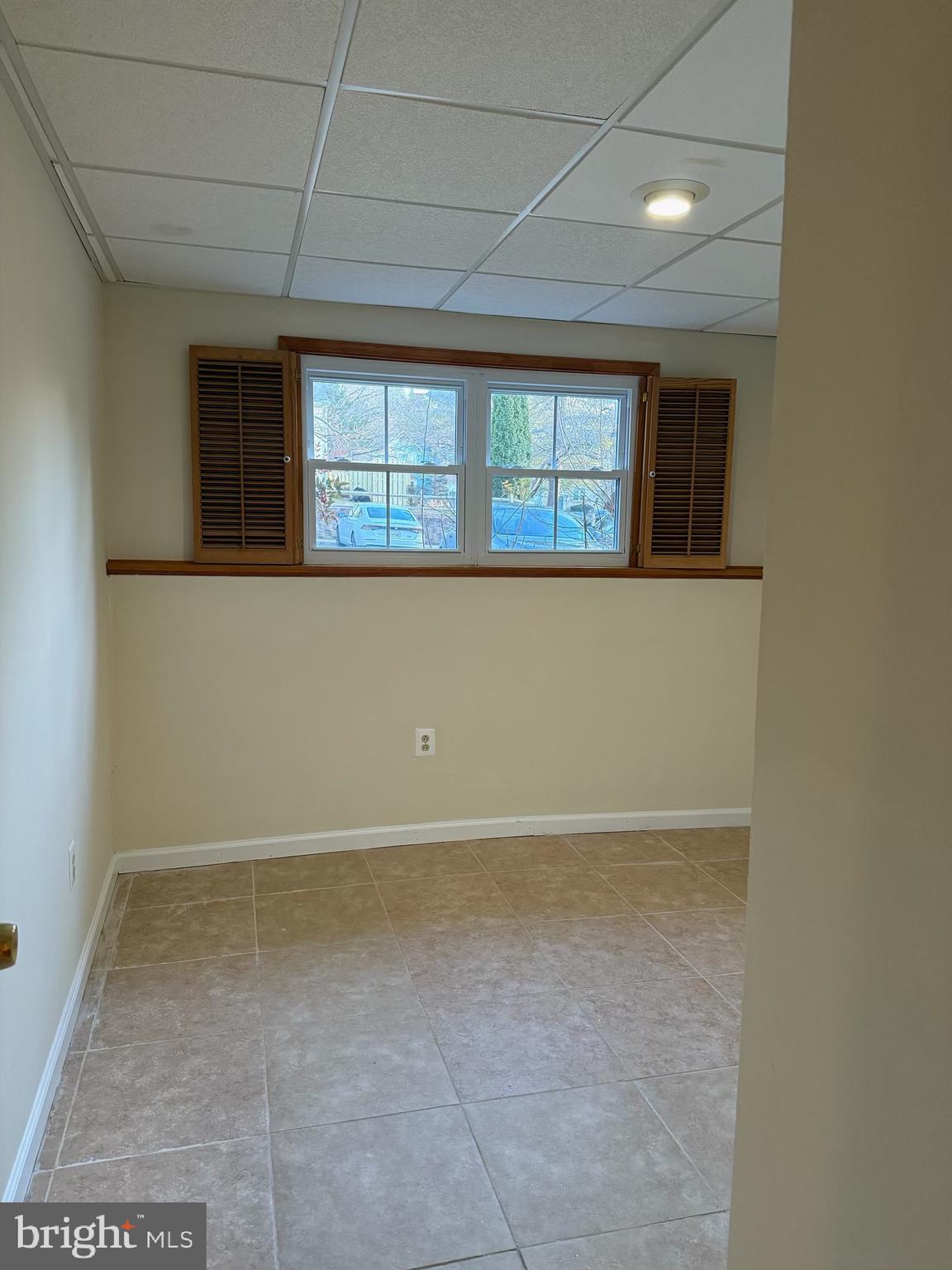18272 Rolling Meadow Way Olney, MD 20832 - Photo 9 of 21 a view of an empty room with a window