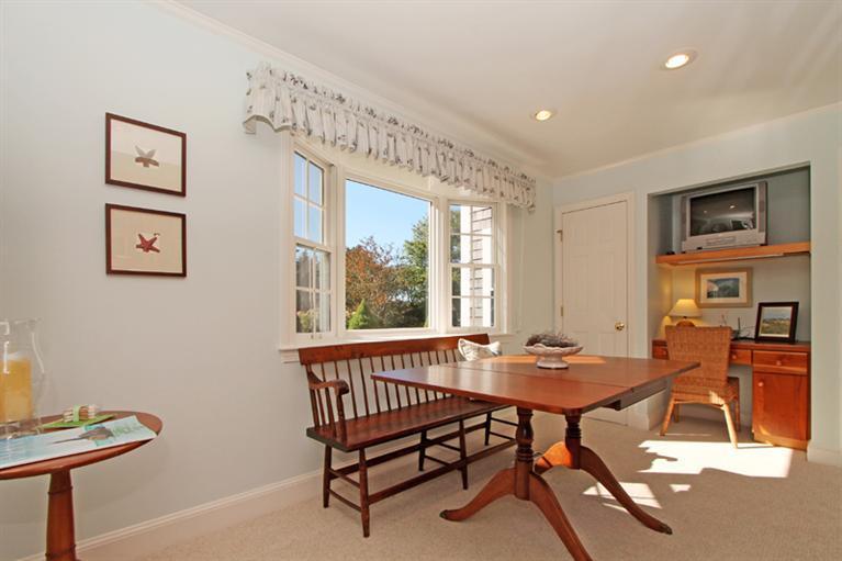 123 Strong Island Road Chatham, MA 02633 - Photo 12 of 34 a view of a workspace with furniture and a window