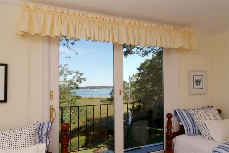 123 Strong Island Road Chatham, MA 02633 - Photo 18 of 34 a view of a balcony with furniture