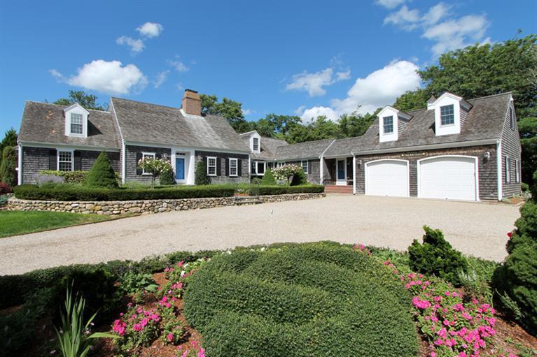 123 Strong Island Road Chatham, MA 02633 - Photo 2 of 34 a front view of a house with a yard and outdoor seating