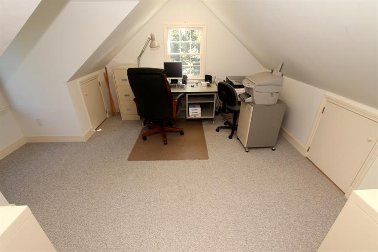 123 Strong Island Road Chatham, MA 02633 - Photo 21 of 34 a view of a workspace with furniture and a window