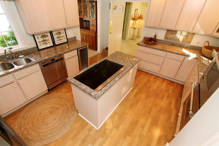 123 Strong Island Road Chatham, MA 02633 - Photo 10 of 34 a kitchen with stainless steel appliances a stove a sink and a refrigerator