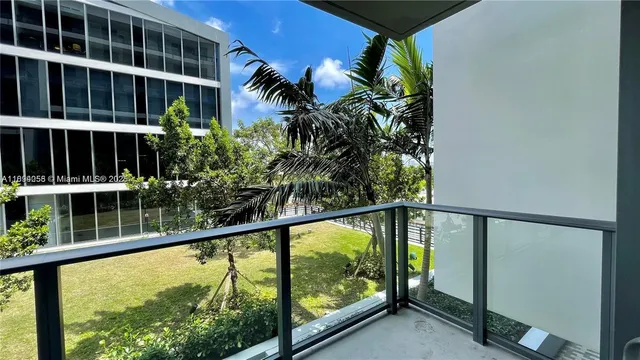 a view of swimming pool from a balcony