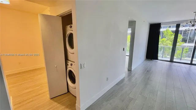 a view of front door and wooden floor