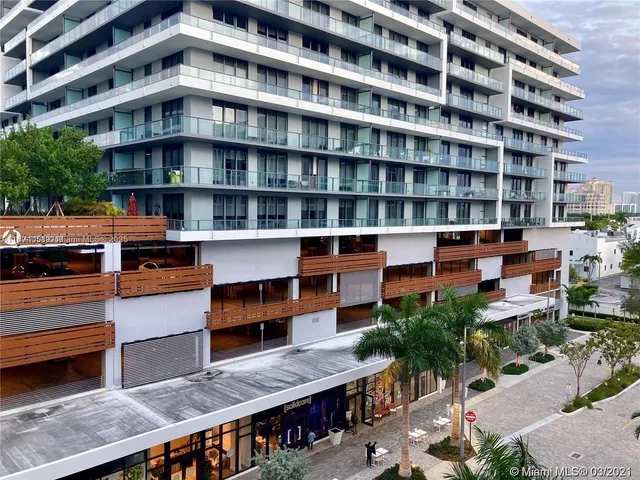 a front view of a building with balcony