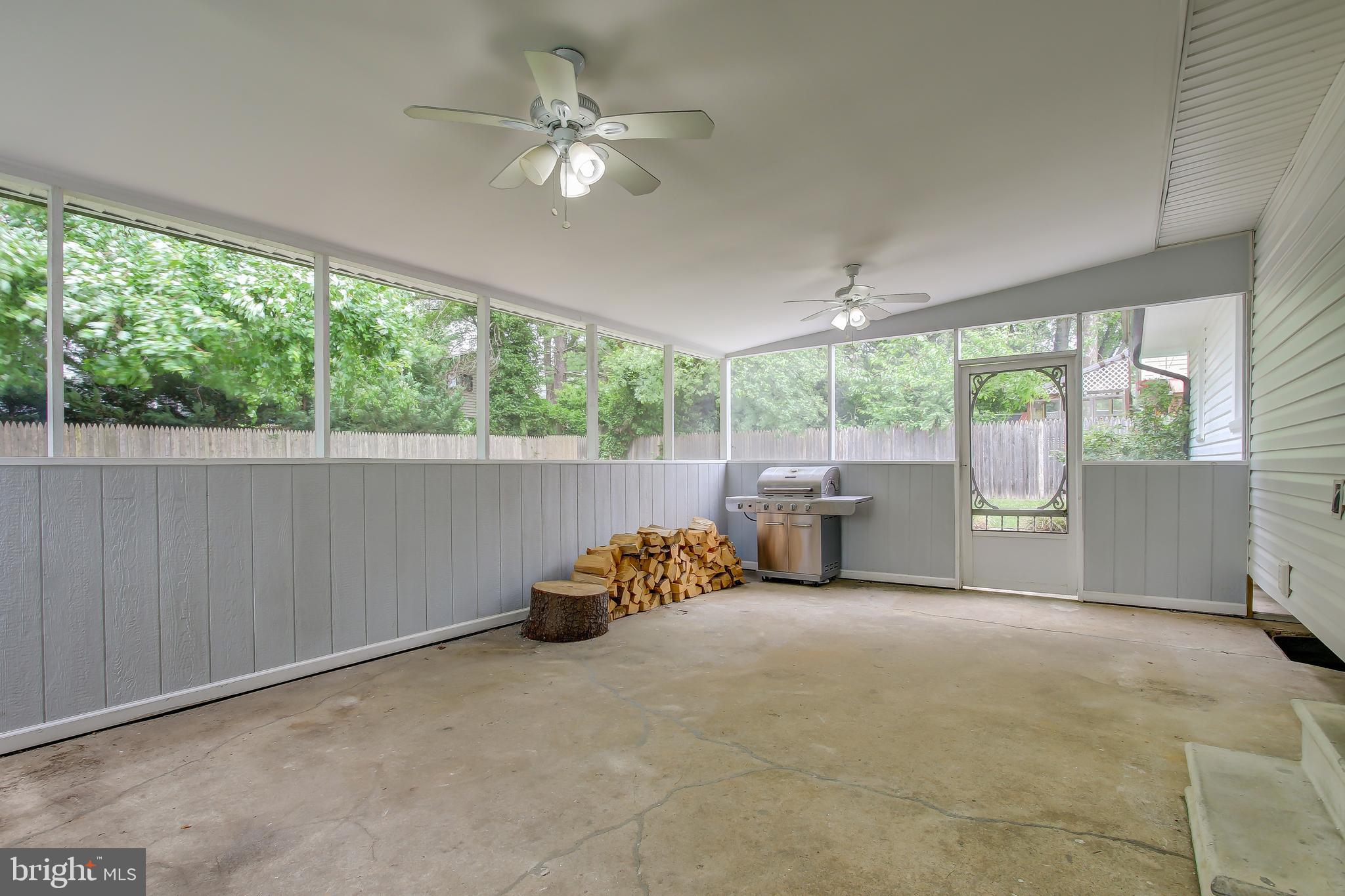 11704 Seven Locks Road Potomac, MD 20854 - Photo 22 of 24 Enclosed porch with ceiling fan