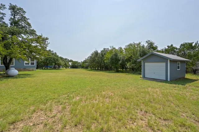 a house view with a outdoor space