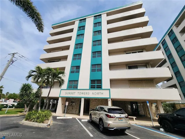 a car parked in front of a building