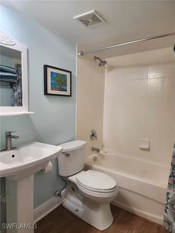 a view of balcony with furniture