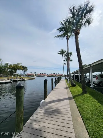 a dining room with a table and chairs