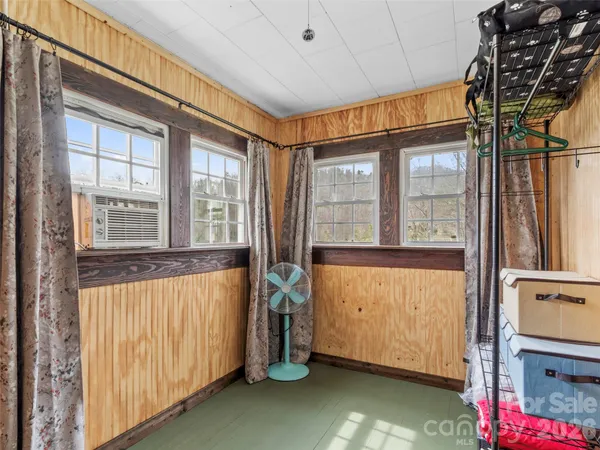 a view of an entryway with a bedroom
