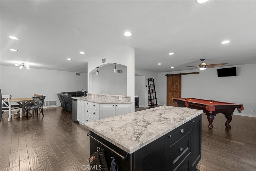 2804 Big Sky Place Simi Valley, CA 93065 - Photo 16 of 36 a large kitchen with a table and chairs
