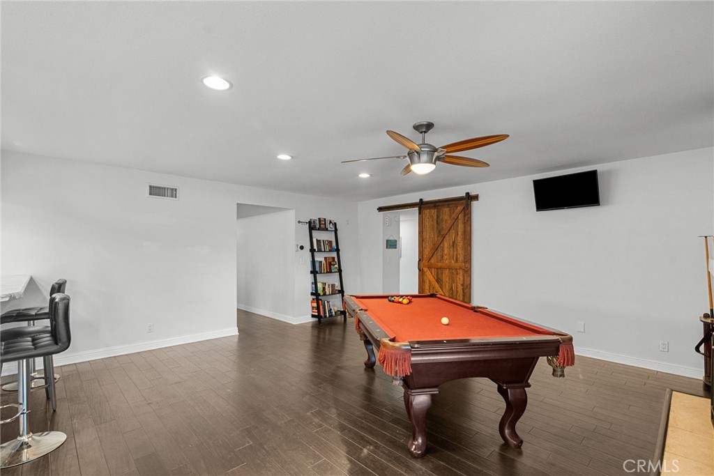 2804 Big Sky Place Simi Valley, CA 93065 - Photo 22 of 36 a room with wooden furniture and ceiling fan