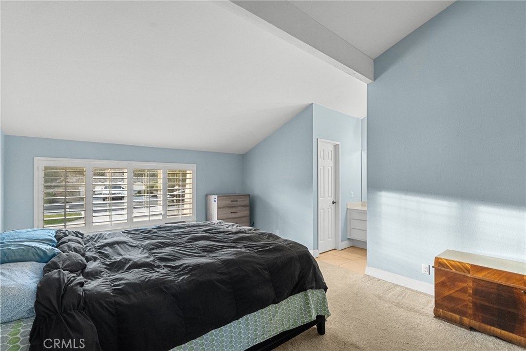 2804 Big Sky Place Simi Valley, CA 93065 - Photo 28 of 36 a bedroom with a bed and a window