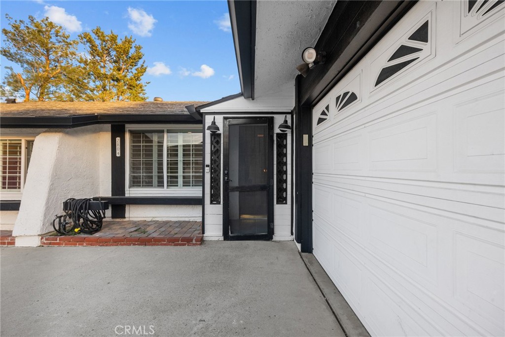 2804 Big Sky Place Simi Valley, CA 93065 - Photo 35 of 36 a view of a door and chair in front of house
