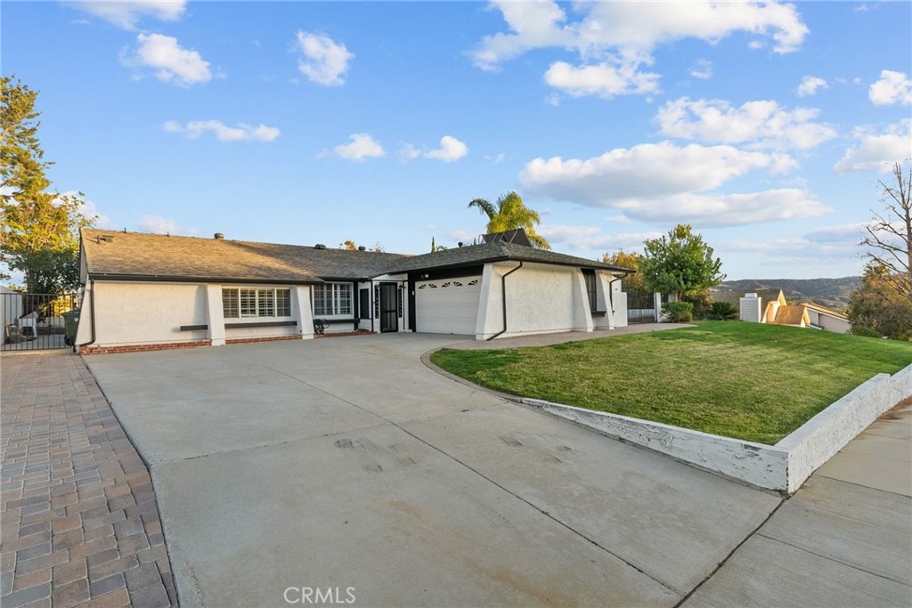 2804 Big Sky Place Simi Valley, CA 93065 - Photo 36 of 36 a front view of a house with a yard
