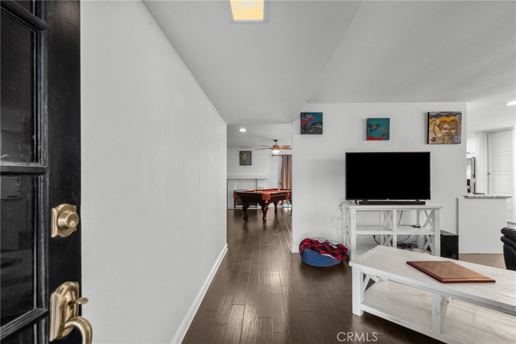 2804 Big Sky Place Simi Valley, CA 93065 - Photo 6 of 36 a living room with furniture and a flat screen tv