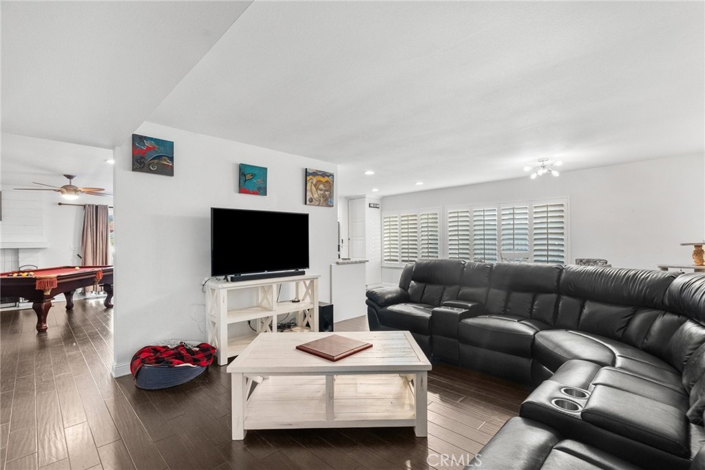2804 Big Sky Place Simi Valley, CA 93065 - Photo 7 of 36 a living room with furniture and a flat screen tv