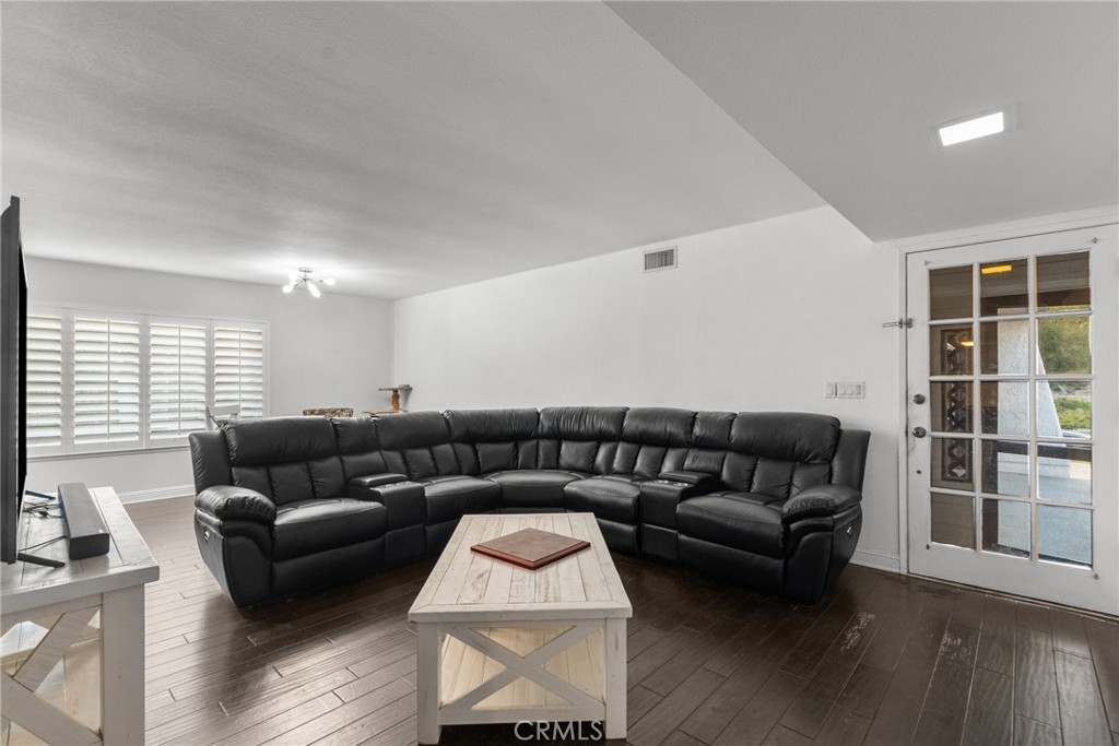 2804 Big Sky Place Simi Valley, CA 93065 - Photo 8 of 36 a living room with furniture and a window