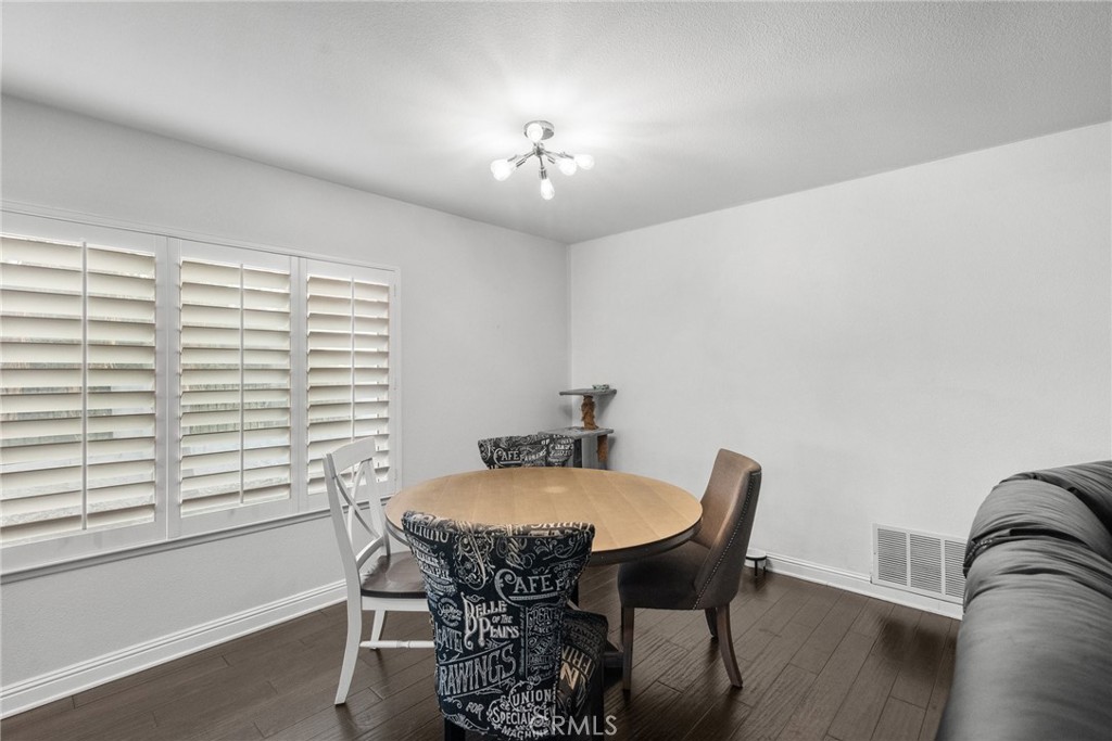 2804 Big Sky Place Simi Valley, CA 93065 - Photo 10 of 36 a view of a dining room with furniture and chandelier