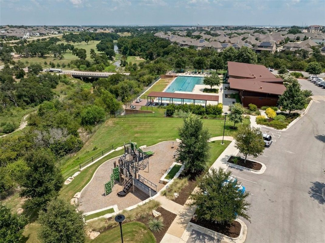 1136 Stetson Hat Trail Georgetown, TX 78628 - Photo 34 of 40 an aerial view of a house with a garden