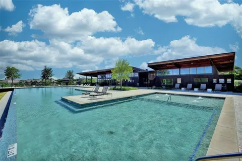 a view of a lake with a yard