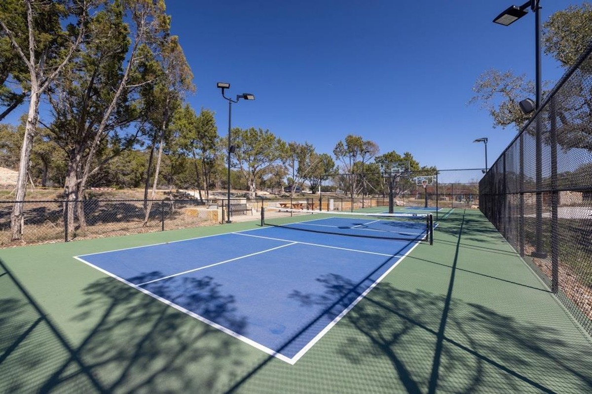 1136 Stetson Hat Trail Georgetown, TX 78628 - Photo 39 of 40 a view of a tennis court