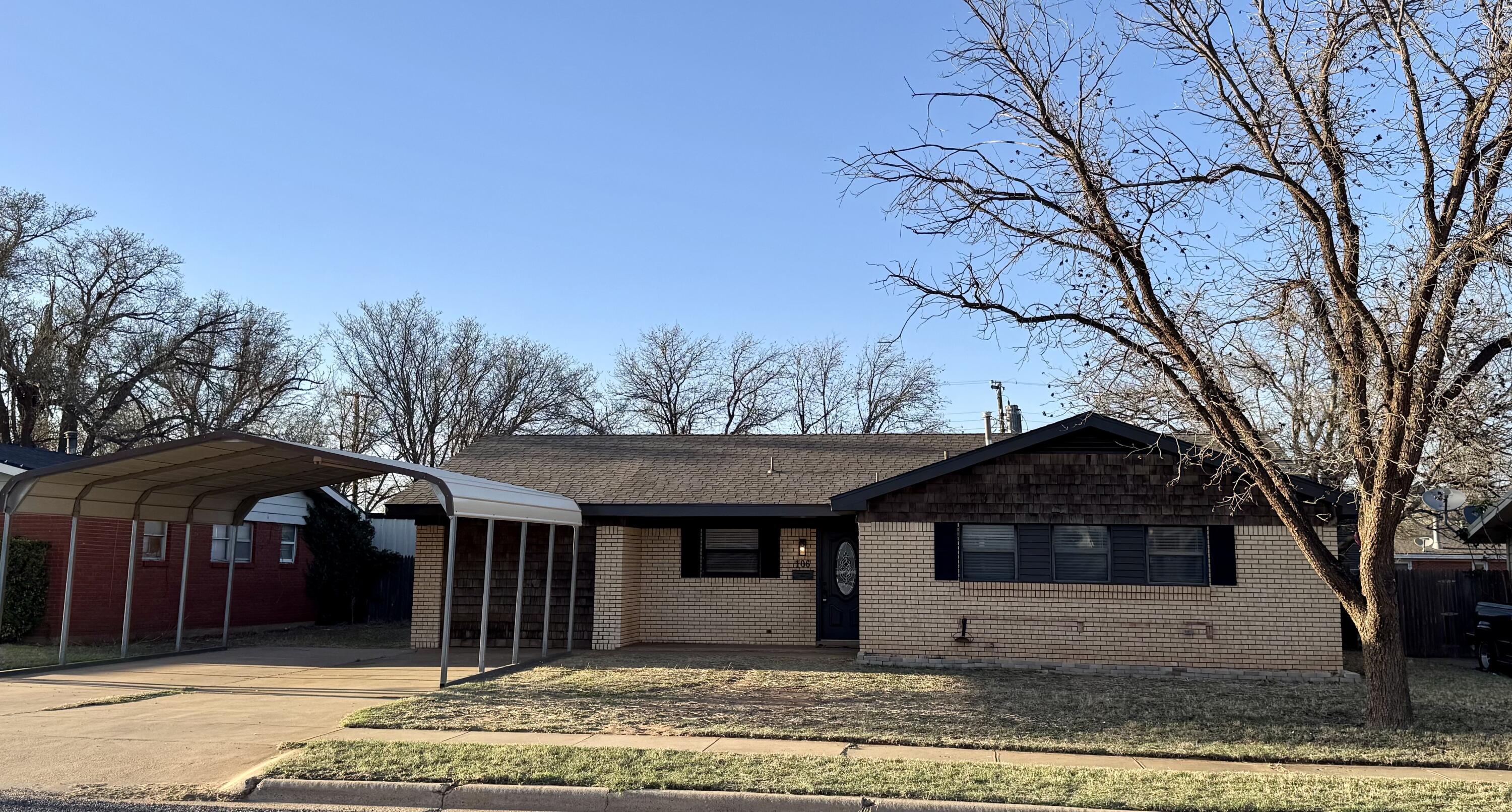 106 North 22nd Place Lamesa, TX 79331 - Photo 81 of 82 a house with trees in the background