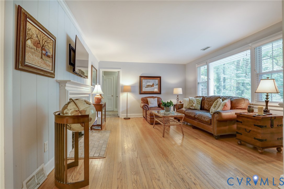1401 Chowan Road Henrico, VA 23229 - Photo 6 of 39 Living area featuring wood-finish flooring, a whit