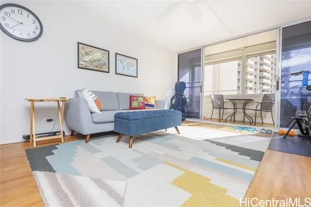 a living room with furniture and a window