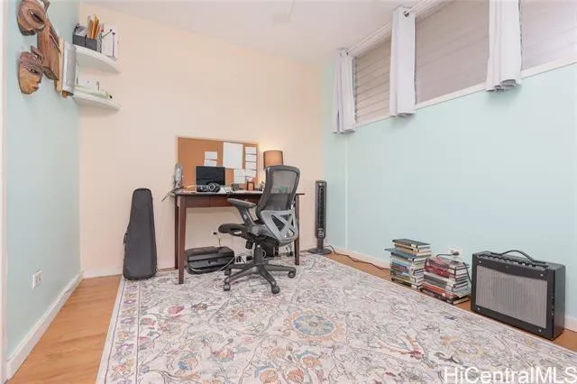 a view of a workspace with furniture