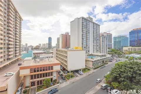 a view of a city with tall buildings
