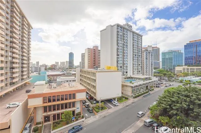 a view of a city with tall buildings