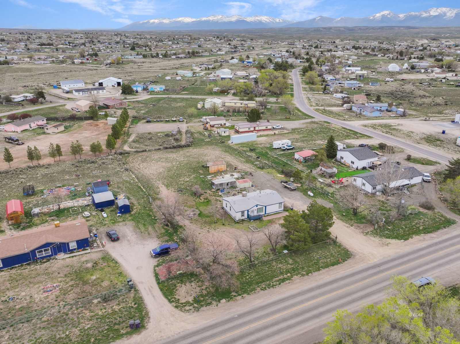378 Spring Valley Parkway Spring Creek, NV 89815 - Photo 29 of 32 an aerial view of residential houses with outdoor space
