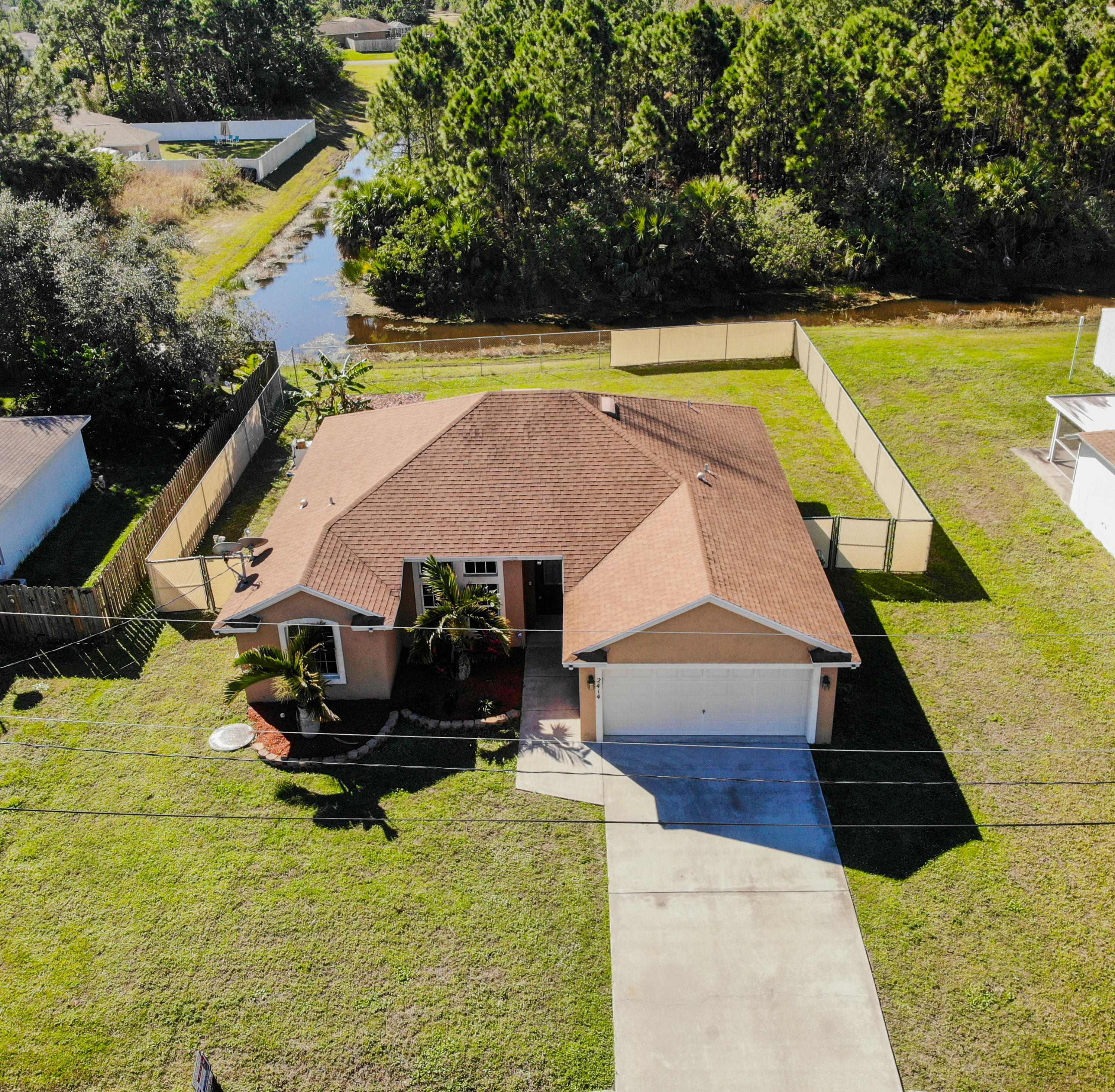 2414 Southwest Fairgreen Road Port St. Lucie, FL 34953 - Photo 1 of 11 DJI_0248