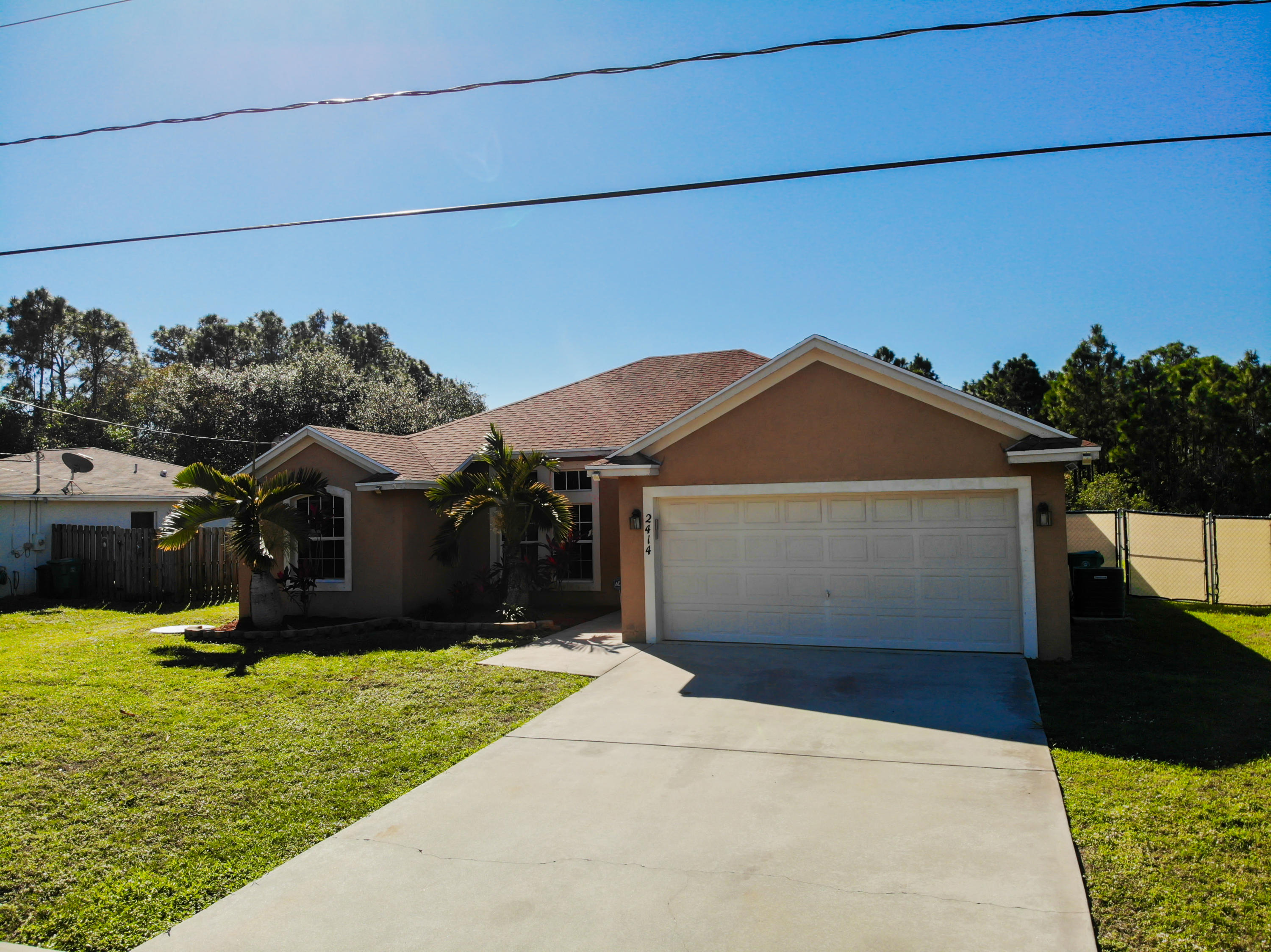 2414 Southwest Fairgreen Road Port St. Lucie, FL 34953 - Photo 2 of 11 DJI_0247