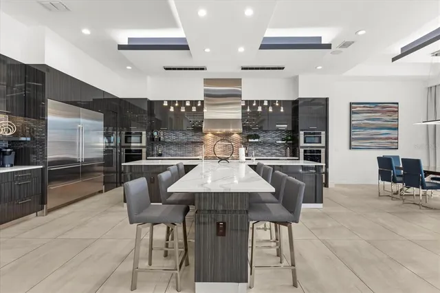 a bathroom with a granite countertop sink mirror and toilet