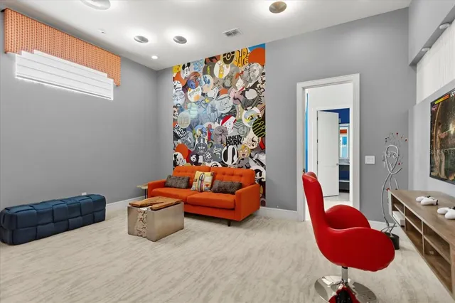 a kitchen with stainless steel appliances granite countertop a sink and a refrigerator