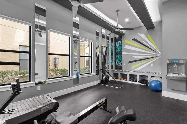 a room with furniture a rug and wooden floor