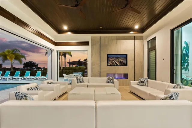 a living room with furniture or outdoor view and a large window