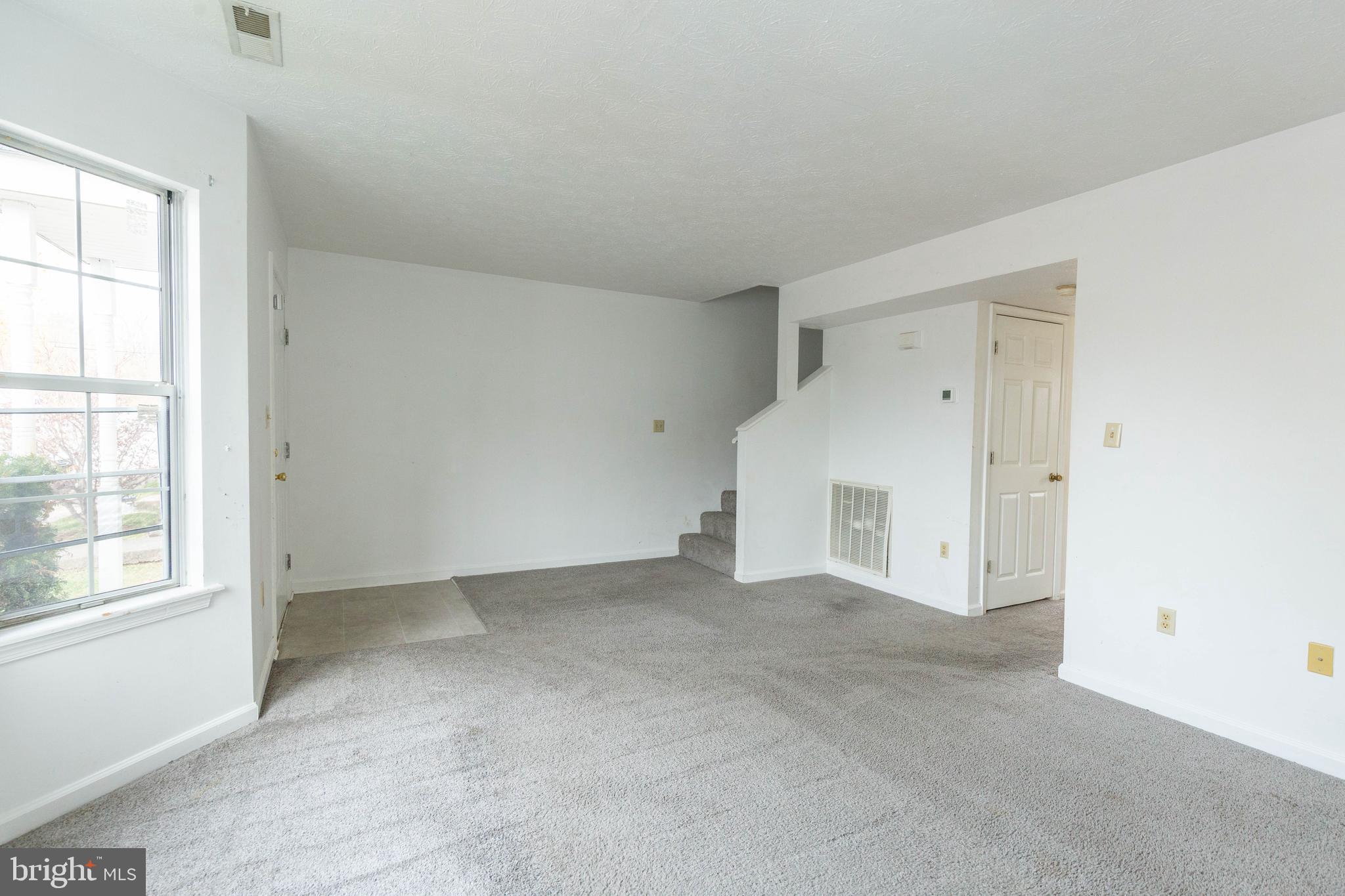 160 Stadium Circle Inwood, WV 25428 - Photo 12 of 29 an empty room with windows