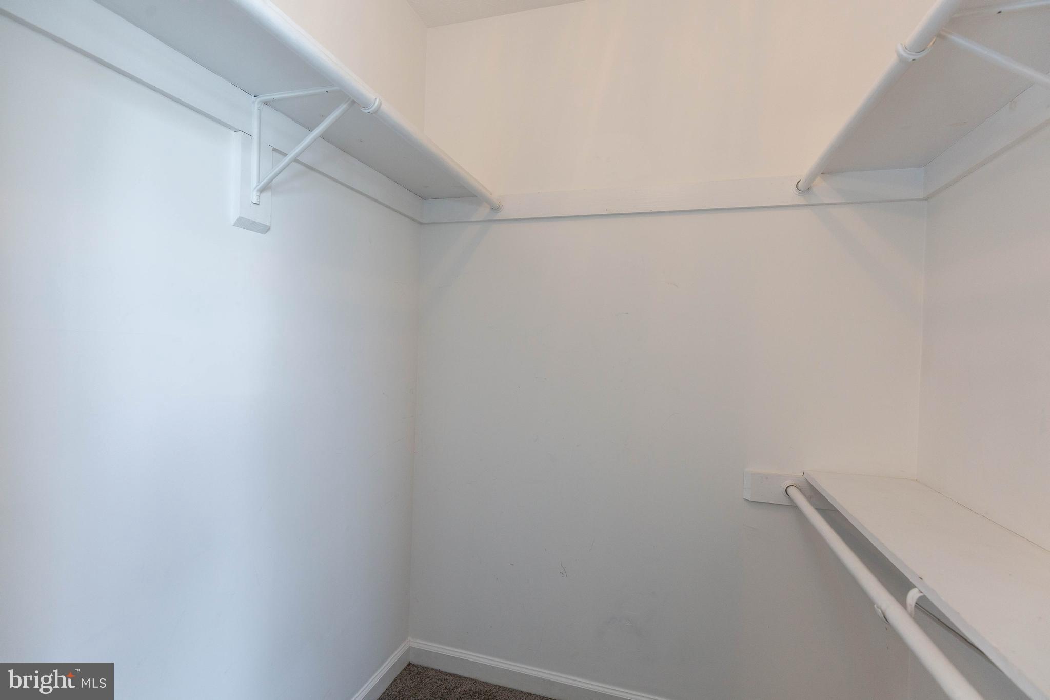 160 Stadium Circle Inwood, WV 25428 - Photo 14 of 29 a view of a room with racks on the wall